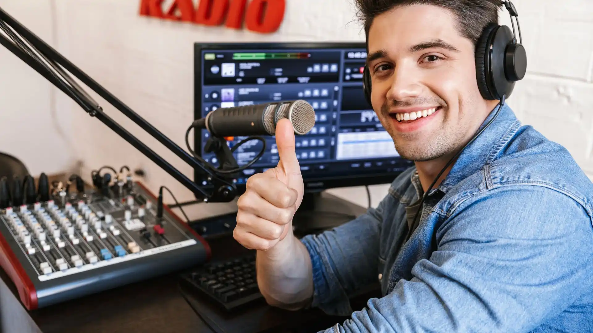Radio presenter broadcasting from a studio